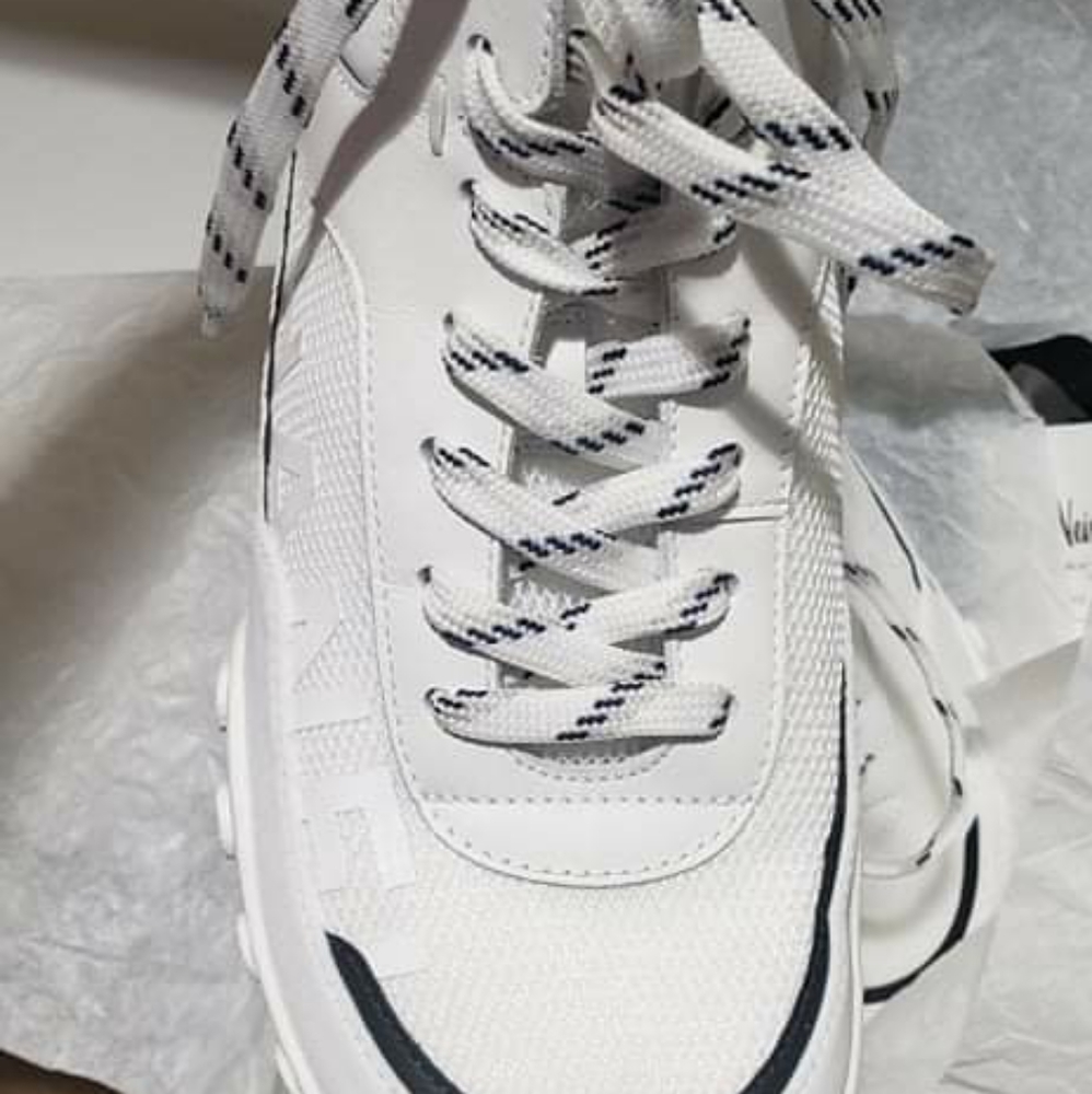 Chanel sneaker sports field